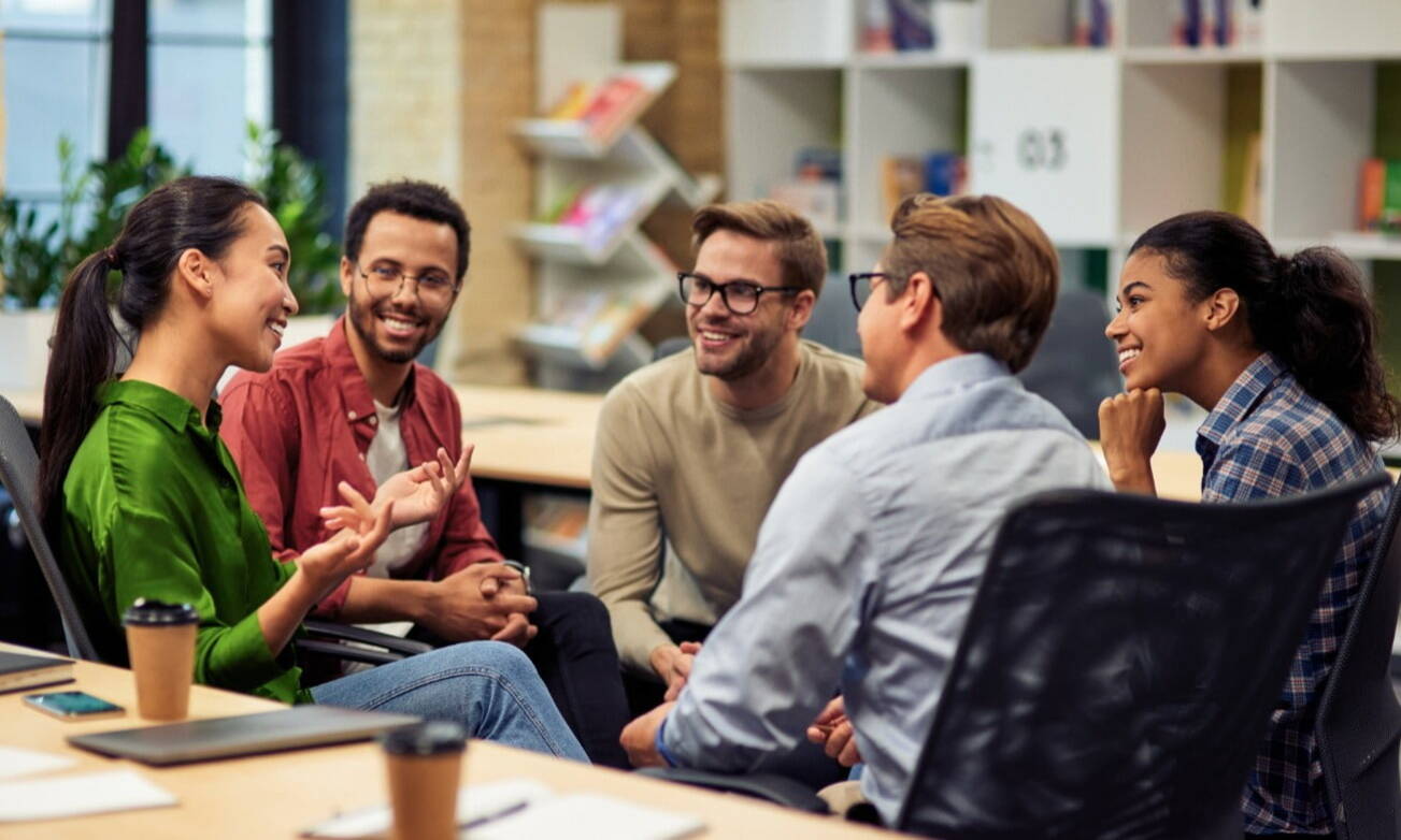 A team of people working hard and sharing ideas that will bring success to the team, involving incentives, bonuses and other motivating factors